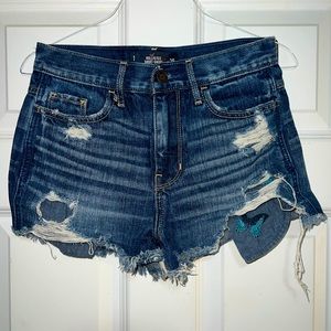 Hollister short-short distressed jean shorts. Dark wash size W25.